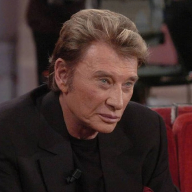 Les cheveux de Johnny Hallyday et Claude François vendus aux enchères créent la surprise
